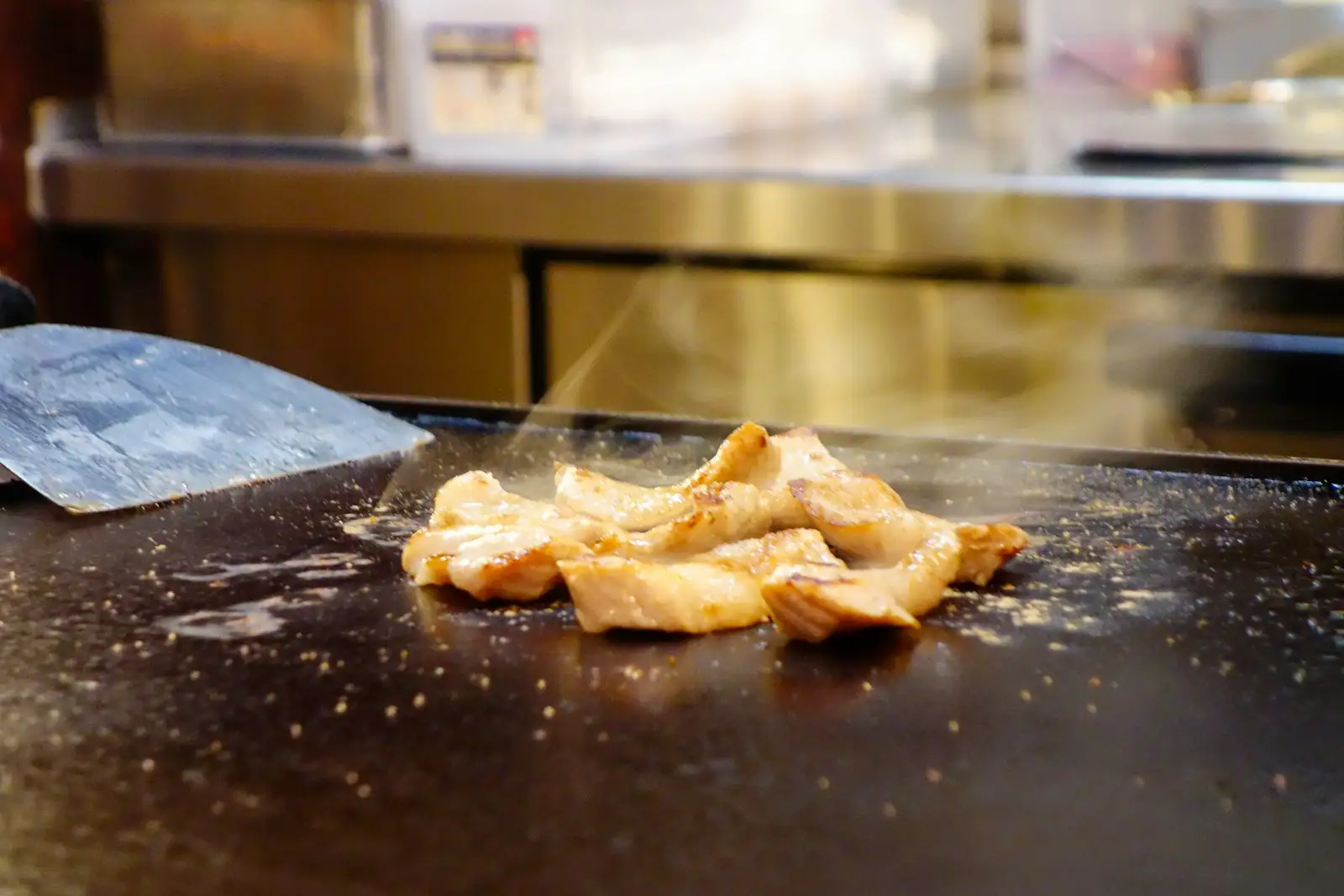 Chicken, shrimp and vegetables cooking on the hibachi flat top at Hibachi K and Sushi in Raleigh